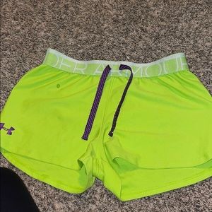 green and purple athletic shorts